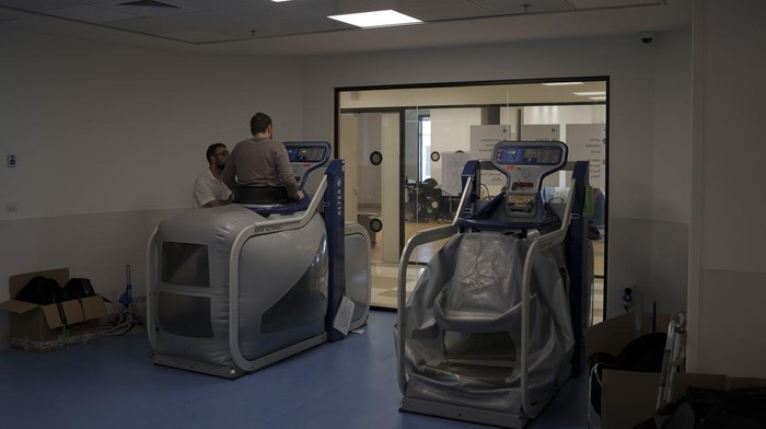 A physiotherapist assists Israeli soldier, Raphael, 21, during his treatment session at the new Gandel Rehabilitation Center of the Hadassah hospital, in Jerusalem, Israel, Wednesday, Feb. 21, 2024. Raphael was injured on the leg by shrapnel during the battles against Hamas in Khan Younis, Gaza Strip, last December. (AP Photo/Leo Correa)