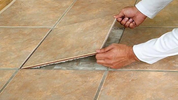 House Ceramic Floor Lifted and Broken
