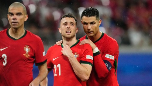 Cristiano Ronaldo centre-forward of Portugal and Al-Nassr FC and Diogo Jota left winger of Portugal and Liverpool FC during the UEFA EURO 2024 group stage match between Portugal and Czechia at Football Stadium Leipzig on June 18, 2024 in Leipzig, Germany. (Photo by Jose Breton/Pics Action/NurPhoto via Getty Images)