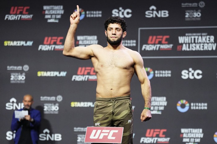 RIYADH, SAUDI ARABIA - JUNE 21: Ikram Aliskerov of Russia poses on the scale during the UFC Fight Night ceremonial weigh-in at Kingdom Arena on June 21, 2024 in Riyadh, Saudi Arabia. (Photo by Jeff Bottari/Zuffa LLC via Getty Images)