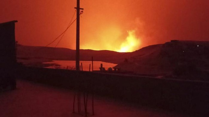 This handout photograph taken and released on June 21 2024 by the Turkish news agency DHA (Demiroren News Agency) shows a fire that swept through two areas between the provinces of Diyarbakir and Mardin. Five people died and dozens were hurt as a huge wildfire swept through several villages in the Kurdish southeastern Turkey overnight, the health minister said Friday. Interior Minister Ali Yerlikaya said the fire started late on June 20, when a 