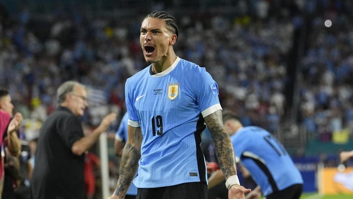 Uruguays Darwin Nunez celebrates after scoring his sides 2nd goal against Panama during a Copa America Group C soccer match in Miami Gardens, Fla, Sunday, June 23, 2024.(AP Photo/Marta Lavandier)