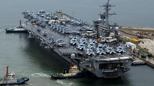 The Theodore Roosevelt (CVN 71), a nuclear-powered aircraft carrier is anchored in Busan, South Korea, June 22, 2024. Song Kyung-Seok/Pool via REUTERS