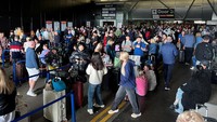 BBC mengatakan penumpang telah disarankan untuk menjauh dari bandara dan pemadaman listrik telah mempengaruhi sistem bagasi dan keamanan. Laporan itu juga mengatakan juru bicara maskapai Easyjet mengatakan penumpang hanya bisa naik ke pesawat dengan membawa tas kabin karena ada masalah dengan sistem bagasi. 