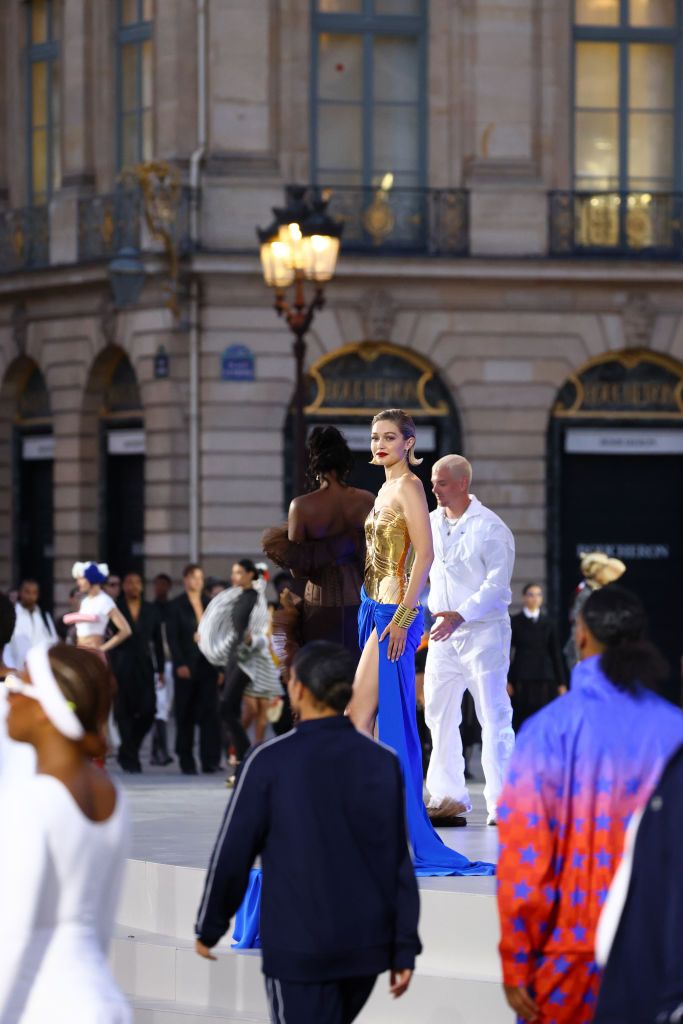 PARIS, FRANCE - JUNE 23: Kendall Jenner and Gigi Hadid ride horses on the runway during Vogue World: Paris at Place Vendome on June 23, 2024 in Paris, France. (Photo by Kristy Sparow/Getty Images for Vogue)