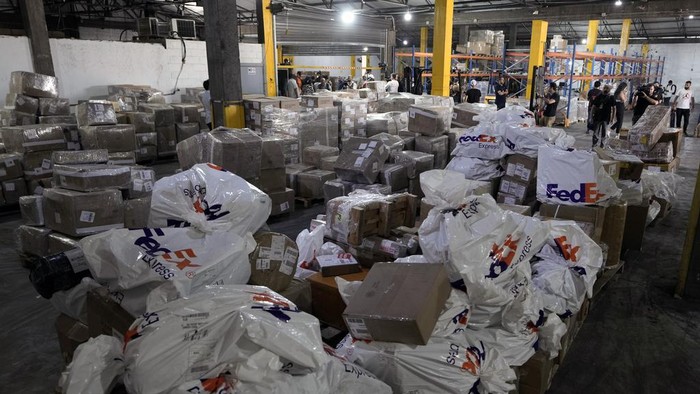 Journalists are given a tour inside a cargo center at the Rafik Hariri International Airport in Beirut, Lebanon, Monday, June 24, 2024. The tour comes a day after a British newspaper published a story, citing anonymous airport workers, claiming that Hezbollah is storing weapons at the airport, as monthslong clashes with the Israeli military on the Lebanon-Israel border have significantly escalated in recent weeks. (AP Photo/Bilal Hussein)