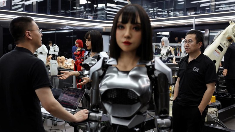 Employees work at the office of humanoid robots developer Ex-Robots in Dalian, Liaoning province, China June 6, 2024. REUTERS/Florence Lo
