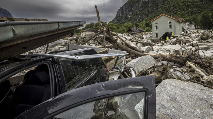 A view of the site of a landslide, caused by severe weather and heavy rain in the Misox valley, in Sorte village, Lostallo, southern Switzerland on Sunday June 23, 2024. Authorities in Switzerland say rescuers have found the body of one of three people who had gone missing on Saturday after massive thunderstorms and rainfall in the southeast of the county caused a rockslide. (Michael Buholzer/Keystone via AP)