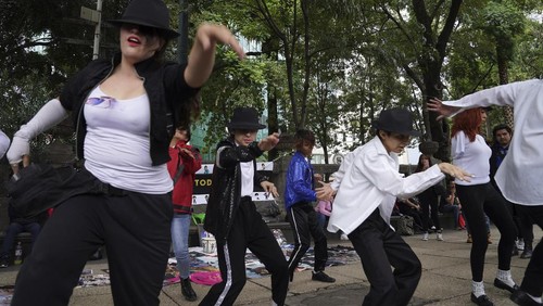 Michael Jackson fans perform to his number one hit 