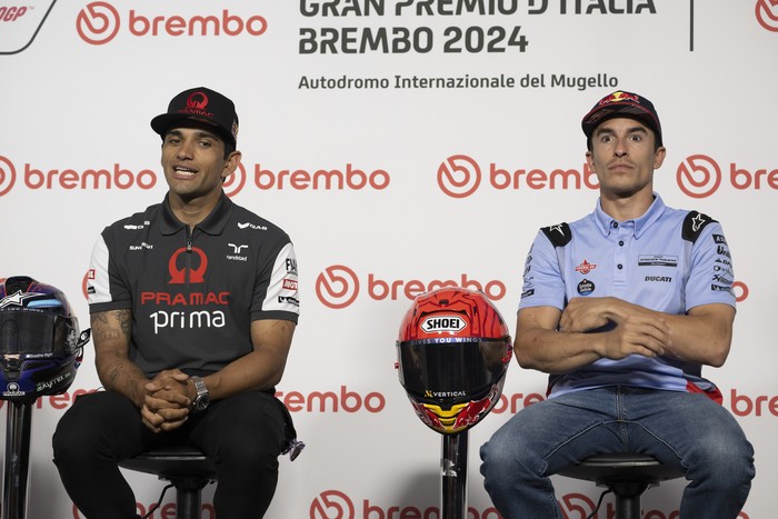 SCARPERIA, ITALY - MAY 30: Jorge Martin of Spain and Prima Pramac Racing (L) speaks and Marc Marquez of Spain and Gresini Racing MotoGP looks on during the press conference during the MotoGP Of Italy - Previews at Mugello Circuit on May 30, 2024 in Scarperia, Italy. (Photo by Mirco Lazzari gp/Getty Images)