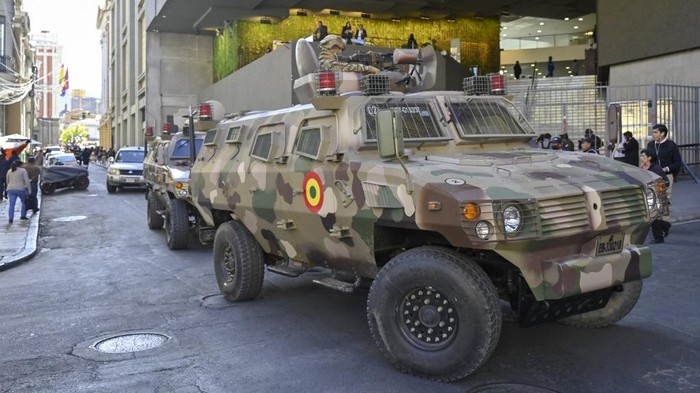 Military troops in armored vehicles are seen in the surroundings of Plaza Murillo in La Paz on June 26, 2024. Bolivian President Luis Arce on Wednesday denounced the unauthorized gathering of soldiers and tanks outside government buildings in the capital La Paz, saying 