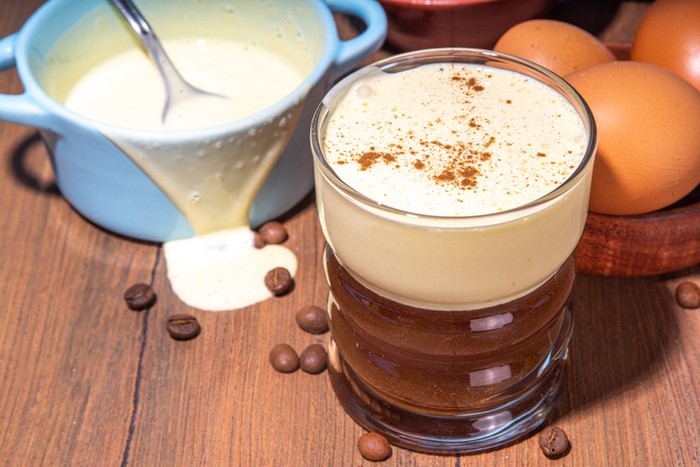 Vietnamese Egg Coffee. Paleo, Dairy-free keto coffee latte drink with sweet sugared Whipped yolks