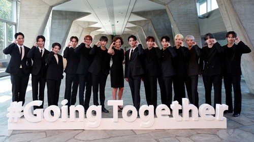 UNESCO Director-General Audrey Azoulay and members of South Korean boy band SEVENTEEN pose during a photocall before their nomination ceremony as Goodwill Ambassador for Youth at the UNESCO headquarters in Paris, France, June 26, 2024. REUTERS/Gonzalo Fuentes