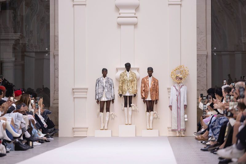A model wears a creation for the Thom Browne Haute Couture Fall-Winter 2024-2025 collection presented Monday, June 24, 2024 in Paris. (Photo by Vianney Le Caer/Invision/AP)