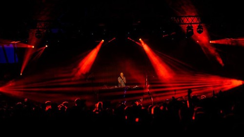 GLASTONBURY, ENGLAND - JUNE 30: Fatboy Slim is silhouetted against graphics as he performs on the Glade State in the early hours of day five of Glastonbury Festival 2024 at Worthy Farm, Pilton on June 30, 2024 in Glastonbury, England. Founded by Michael Eavis in 1970, Glastonbury Festival features around 3,000 performances across over 80 stages. Renowned for its vibrant atmosphere and iconic Pyramid Stage, the festival offers a diverse lineup of music and arts, embodying a spirit of community, creativity, and environmental consciousness. (Photo by Leon Neal/Getty Images)