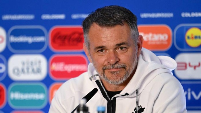 COLOGNE, GERMANY - JUNE 29: Willy Sagnol, Head Coach of Georgia, speaks during the press conference at Cologne Stadium on June 29, 2024 in Cologne, Germany. (Photo by Teresa Kröger - UEFA/UEFA via Getty Images)