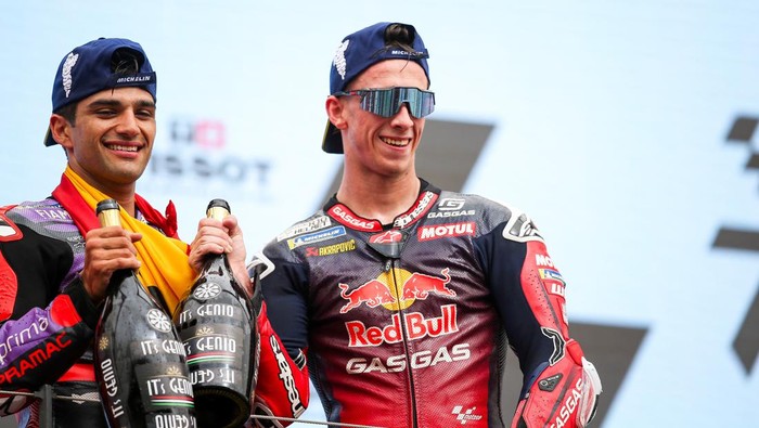 LAGOA, ALGARVE, PORTUGAL - MARCH 24: Jorge Martin of Pramac Racing and Spain and Pedro Acosta of Tech 3 and Spain celebrate on the podium during the Race of the MotoGP Of Portugal at Autodromo do Algarve on March 24, 2024 in Lagoa, Algarve, Portugal. (Photo by Diogo Cardoso/DeFodi Images via Getty Images)