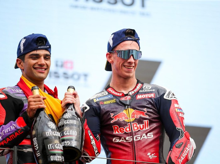 LAGOA, ALGARVE, PORTUGAL - MARCH 24: Jorge Martin of Pramac Racing and Spain and Pedro Acosta of Tech 3 and Spain celebrate on the podium during the Race of the MotoGP Of Portugal at Autodromo do Algarve on March 24, 2024 in Lagoa, Algarve, Portugal. (Photo by Diogo Cardoso/DeFodi Images via Getty Images)