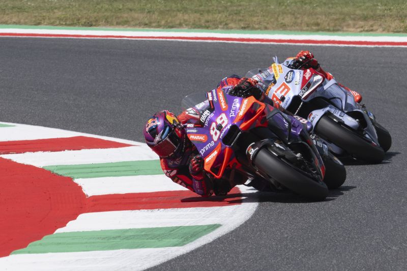 SCARPERIA, ITALY - JUNE 01: Jorge Martin of Spain and Prima Pramac Racing  leads Marc Marquez of Spain and Gresini Racing MotoGP during the MotoGP Of Italy - Sprint at Mugello Circuit on June 01, 2024 in Scarperia, Italy. (Photo by Mirco Lazzari gp/Getty Images)