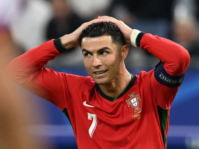 Soccer Football - Euro 2024 - Quarter Final - Portugal v France - Hamburg Volksparkstadion, Hamburg, Germany - July 5, 2024 Portugals Cristiano Ronaldo reacts after missing a chance to score REUTERS/Carmen Jaspersen