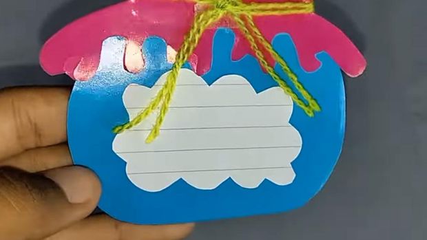 Name Tag bentuk toples.