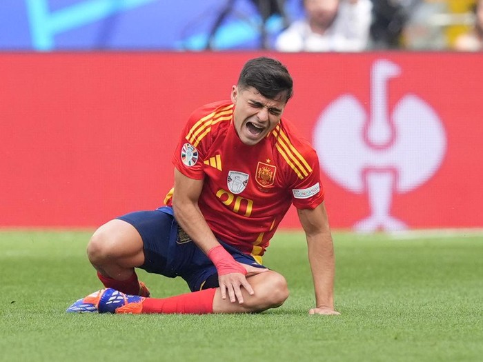 Spains Pedri looks in pain after an injury before leaving the game during the UEFA Euro 2024, quarter-final match at the Stuttgart Arena in Stuttgart, Germany. Picture date: Friday July 5, 2024. (Photo by Martin Rickett/PA Images via Getty Images)