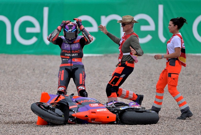 MotoGP - German Grand Prix - Sachsenring, Hohenstein-Ernstthal, Germany - July 7, 2024 Prima Pramac Racings Jorge Martin reacts after he crashes out of the race REUTERS/Matthias Rietschel     TPX IMAGES OF THE DAY