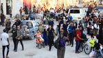 Potret Anak-anak Palestina Mengungsi dengan Sepeda