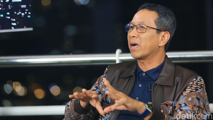 Heru Budi Pj Gubernur Jakarta hadir di dRooftalk, Senin (8/7/2024).