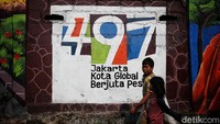 Salah satu mural dibuat dalam rangka menyambut HUT ke-497 Jakarta.
