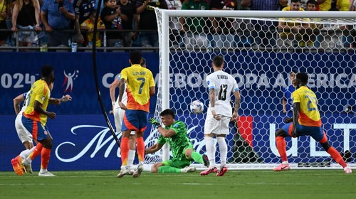 CHARLOTTE, NORTH CAROLINA - JULY 10: Sergio Rochet #1 of Uruguay is unable to stop the shot of Jefferson Lerma #16 of Colombia during the first half of the semi-final match between Uruguay and Colombia in the CONMEBOL Copa America USA 2024 at Bank of America Stadium on July 10, 2024 in Charlotte, North Carolina. (Photo by Robin Alam/ISI Photos/Getty Images)