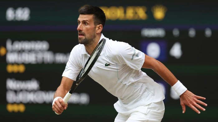 LONDON, ENGLAND - JULY 12: Novak Djokovic (SRB) during his Gentlemens Singles Semi-Final match against Lorenzo Musetti (ITA) during day twelve of The Championships Wimbledon 2024 at All England Lawn Tennis and Croquet Club on July 12, 2024 in London, England. (Photo by Rob Newell - CameraSport via Getty Images)