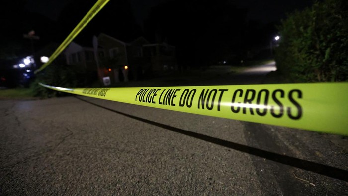 Law enforcement members from the Allegheny County Police Department, guard the perimeter of the home of the 20-year-old Thomas Matthew Crooks, named by the FBI as the 