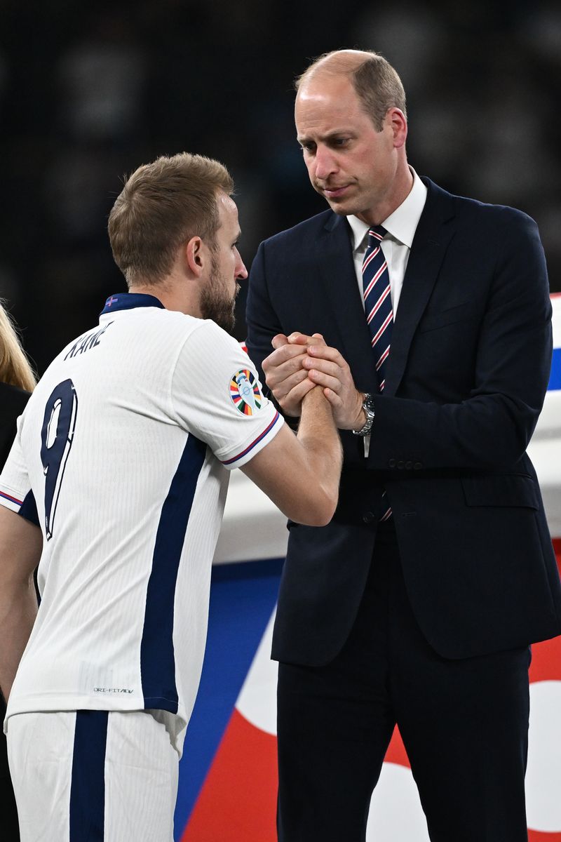 14 July 2024, Berlin: Soccer, UEFA Euro 2024, European Championship, Final, Spain - England, Olympiastadion Berlin, William (r), Prince of Wales, and his son Prince George stand in the stands before the start of the match. Photo: Federico Gambarini/dpa (Photo by Federico Gambarini/picture alliance via Getty Images)