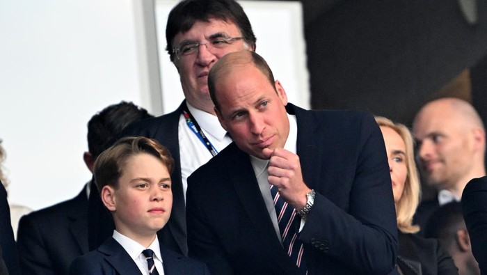 14 July 2024, Berlin: Soccer, UEFA Euro 2024, European Championship, Final, Spain - England, Olympiastadion Berlin, William (r), Prince of Wales, and his son Prince George stand in the stands before the start of the match. Photo: Federico Gambarini/dpa (Photo by Federico Gambarini/picture alliance via Getty Images)
