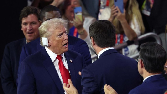Republican presidential candidate and former President Donald Trump attends Day 1 of the Republican National Convention (RNC), at the Fiserv Forum in Milwaukee, Wisconsin, U.S., July 15, 2024. REUTERS/Callaghan Ohare