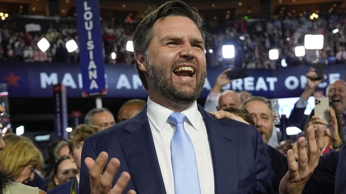 Republican vice presidential candidate Sen. JD Vance, R-Ohio, arrives on the floor during the first day of the 2024 Republican National Convention at the Fiserv Forum, Monday, July 15, 2024, in Milwaukee. (AP Photo/Carolyn Kaster)