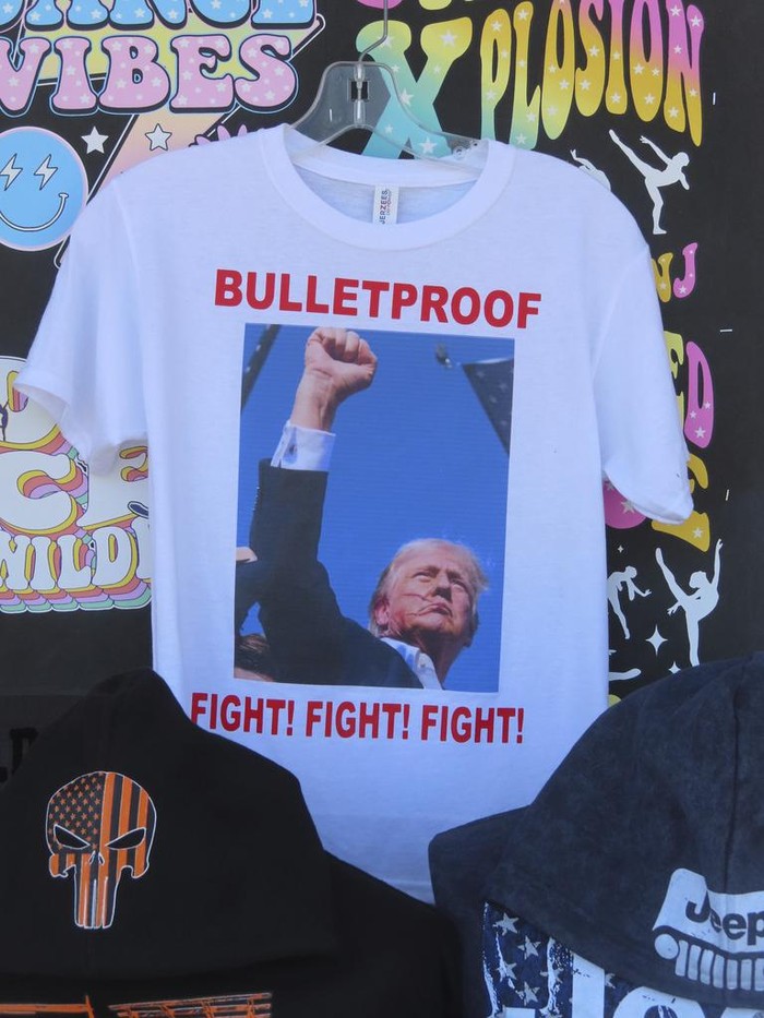 Trump Shooting-T-Shirts T-shirts referencing the shooting of former President Donald Trump were selling briskly on the boardwalk in Wildwood, N.J. on July 15, 2024, less than 48 hours after the incident. (AP Photo/Wayne Parry)