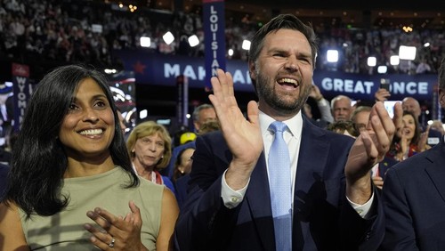 Republican vice presidential candidate Sen. JD Vance arrives with his wife Usha Chilukuri Vance at the Republican National Convention Monday, July 15, 2024, in Milwaukee. (AP/Carolyn Kaster/AP Photo/Paul Sancya)