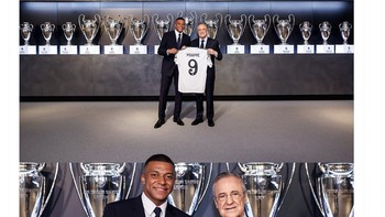 Mbappe berpose bersama Florentino Perez di depan deretan trofi Real Madrid. Foto: Twitter