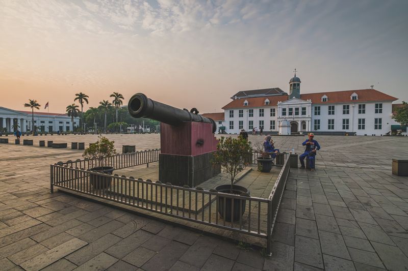 Jakarta, Indonesia - May 7th, 2024. a Historic Si Jagur cannon on display in a peaceful Fatahillah Square in the morning.