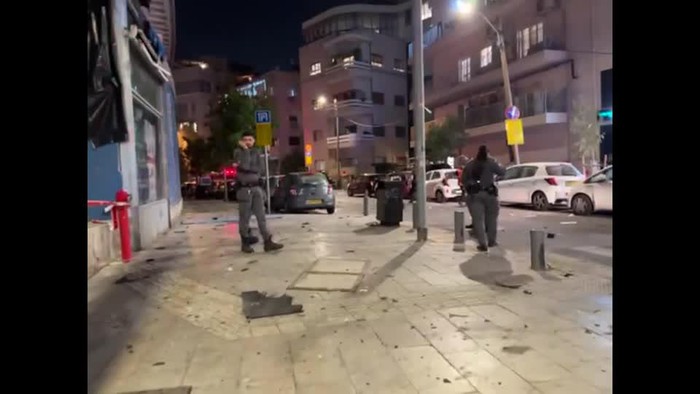 0103WD-ISRAEL-PALESTINIANS_TEL_AVIV_BLAST_AMBULANCE_O_
