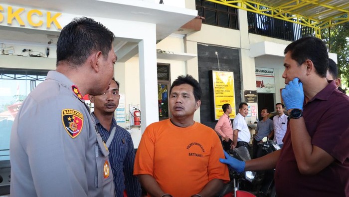 Nafar (44), preman pemalak sopir truk di Bangkalan saat ditangkap