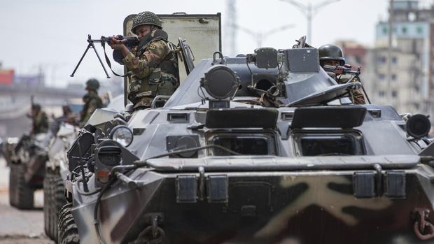 Bangladeshi military force soldiers on armored vehicles patrol the streets of Dhaka, Bangladesh, Saturday, July 20, 2024. (AP Photo/Rajib Dhar)