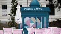 Plaza Desa Olimpiade yang bisa digunakan untuk bersantai.