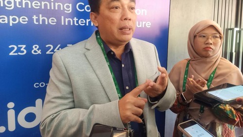 Ketua Pengelola Nama Domain Internet Indonesia (PANDI) Jhon Sihar Simanjuntak saat ditemui di The Westin Resort, Nusa Dua, Badung, Bali pada Selasa (23/7/2024).