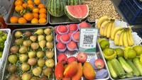 Buah-buahan di Xinjiang terkenal berkualitas tinggi, dengan Qris sebagai model pembayaran.