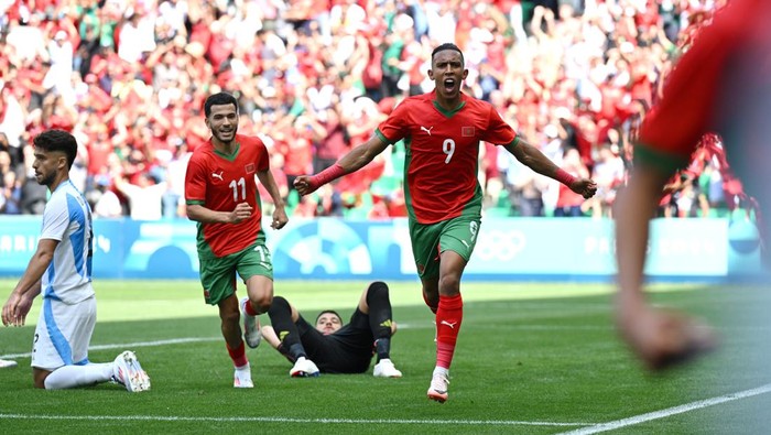 SAINT-ETIENNE, FRANCE - JULY 24: Soufiane Rahimi #9 of Team Morocco celebrates scoring his teams first goal during the Mens group B match between Argentina and Morocco during the Olympic Games Paris 2024 at Stade Geoffroy-Guichard on July 24, 2024 in Saint-Etienne, France. (Photo by Tullio M. Puglia/Getty Images)