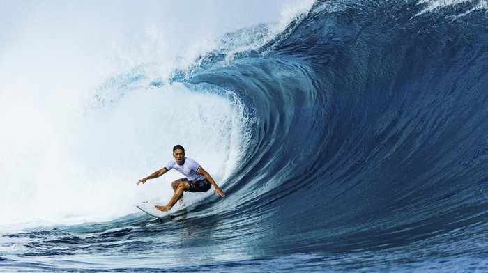 Rio Waida, of Indonesia, surfs on a training day ahead of the 2024 Summer Olympics surfing competition, Tuesday, July 23, 2024, in Teahupoo, Tahiti. (Ed Sloane/Pool Photo via AP)