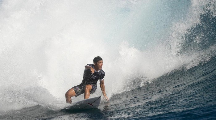 Rio Waida, of Indonesia, surfs during a training day ahead of the 2024 Summer Olympics surfing competition, Tuesday, July 23, 2024, in Teahupo'o, Tahiti. (AP Photo/Gregory Bull)